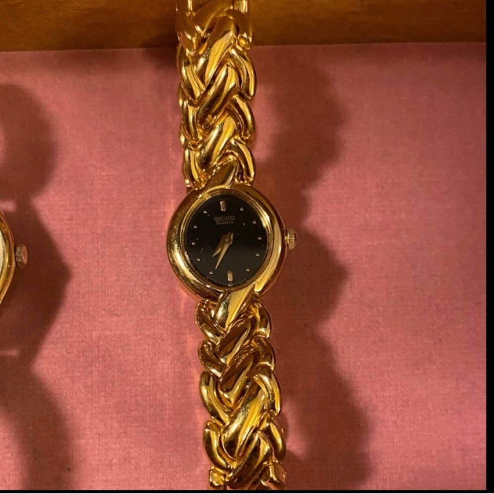 Seiko Women's Black and Gold Watch
